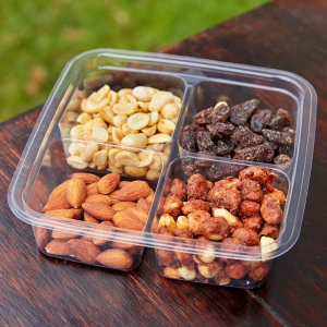 4 COMPARTMENT PLA SHALLOW : Elementa Inc 4 Compartment Clear PLA Container filled with nuts.