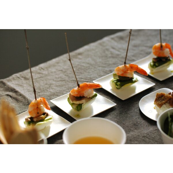 Compostable Kaku Small Tasting Plate filled with shrimps