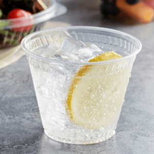 PLA cold cup pic : Elementa Inc 9oz Compostable PLA Cold Cup Squat filled with ice and lemon