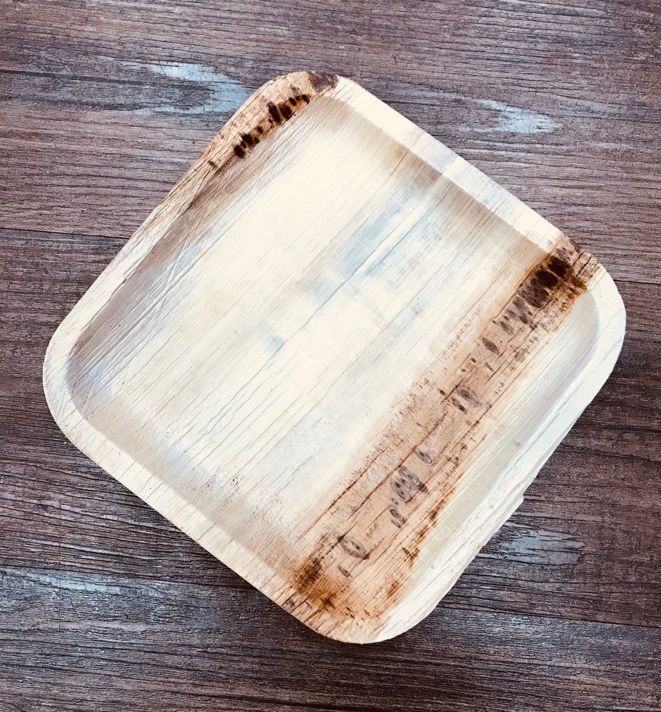 Square Palm Leaf Plate on a wooden table